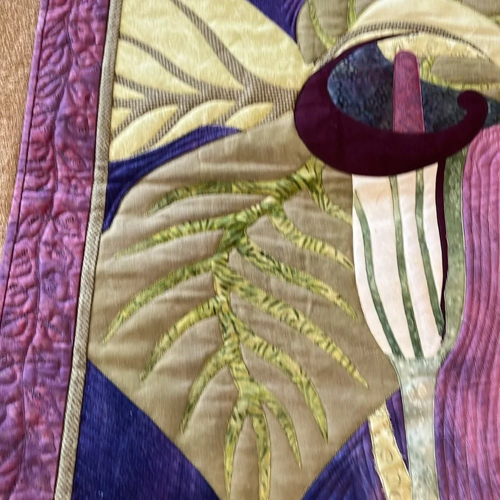Homemade quilted wall hanging.
